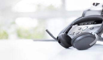 Headset and deskphone on desk