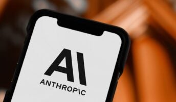 Anthropic logo on phone in black and white background