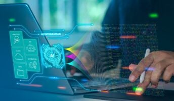 individual on computer analyzing AI integration