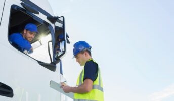 man assessing truck driver