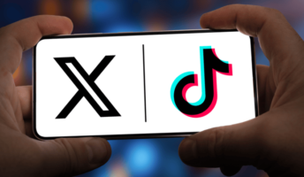 X and TikTok logo on a phone